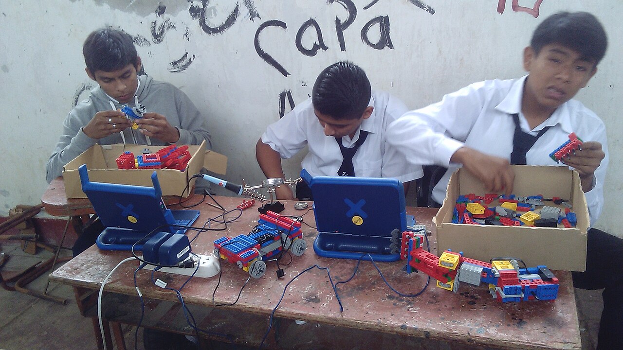 Students building a robotic prototype